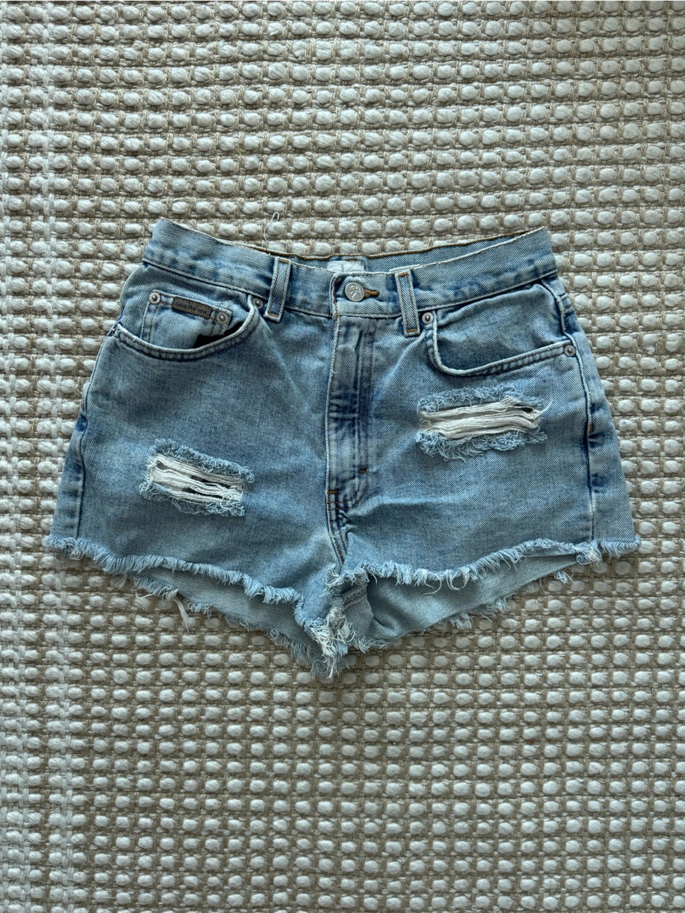 Calvin Klein Light Blue Distressed Denim Cutoff Shorts